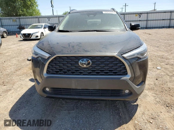 2023 Toyota Corolla Cross XLE с VIN 7MUDAABG9PV076750, выставлен на аукционе Copart как лот 51434765 с пробегом Не указан миль и Списание • Salvage title. История ставок и продаж доступна на DreamBid. Изображение 5.