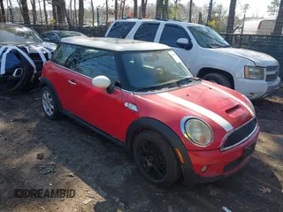 2010 MINI Hardtop S with VIN WMWMF7C5XATZ74419, listed as a IAAI auction lot 41781254 with 107,442 mi miles and . Bid and sale history available at DreamBid. Image 1.