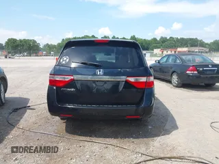 2011 Honda Odyssey EX-L with VIN 5FNRL5H69BB037248, listed as a IAAI auction lot 42613070 with 101,008 mi miles and . Bid and sale history available at DreamBid. Image 16.