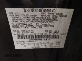 2011 Ford Taurus SEL with VIN 1FAHP2EW4BG160633, listed as a IAAI auction lot 41778406 with 125,934 mi miles. Bid and sale history available at carsss.com. Image 9.