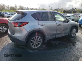 2015 Mazda CX-5 Grand Touring with VIN JM3KE2DY5F0507904, listed as a Copart auction lot 50542895 with 160,736 mi miles and Salvage Title. Bid and sale history available at carsss.com. Image 3.