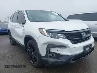 2021 Honda Pilot Special Edition with VIN 5FNYF5H28MB040600, listed as a IAAI auction lot 41512530 with 23,528 mi miles and . Bid and sale history available at carsss.com. Image 1.