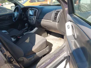 2006 Mazda Tribute i with VIN 4F2YZ02Z16KM00215, listed as a IAAI auction lot 42153919 with 272,828 mi miles and . Bid and sale history available at carsss.com. Image 5.