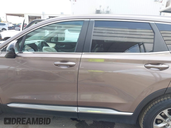 2020 Hyundai Santa Fe SE with VIN 5NMS23AD6LH220012, listed as a IAAI auction lot 42317046 with 141,055 mi miles and . Bid and sale history available at DreamBid. Image 14.