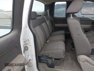 2009 Ford F-150 STX with VIN 1FTRX12W59KB75341, listed as a IAAI auction lot 42045577 with 195,427 mi miles and . Bid and sale history available at DreamBid. Image 8.
