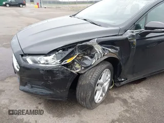 2015 Ford Fusion SE z VIN 3FA6P0H72FR305506, wystawiony jako IAAI lot #42139545 z przebiegiem 94 461 mil mil oraz . Historia ofert i sprzedaży dostępna na DreamBid. Obrazek 6.