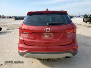 2017 Hyundai Santa Fe 2.4L z VIN 5XYZU3LB5HG473456, wystawiony jako Copart lot #55631615 z przebiegiem 92 374 mil mil oraz Szkoda całkowita • Salvage title. Historia ofert i sprzedaży dostępna na DreamBid. Obrazek 6.