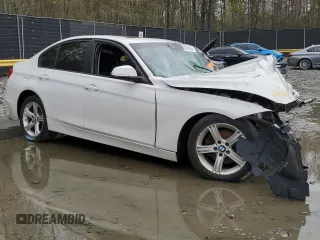2012 BMW 3 Series 328i с VIN WBA3C1C51CF433150, выставлен на аукционе Copart как лот 52412865 с пробегом Не указан миль и Списание • Salvage title. История ставок и продаж доступна на DreamBid. Изображение 4.