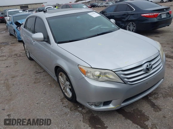 2012 Toyota Avalon z VIN 4T1BK3DB7CU453850, wystawiony jako IAAI lot #41425863 z przebiegiem 142 623 mil mil oraz . Historia ofert i sprzedaży dostępna na DreamBid. Obrazek 1.