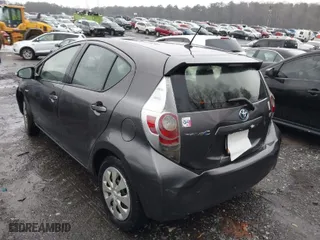 2013 Toyota Prius c One with VIN JTDKDTB32D1548295, listed as a IAAI auction lot 41768516 with 104,708 mi miles. Bid and sale history available at carsss.com. Image 3.