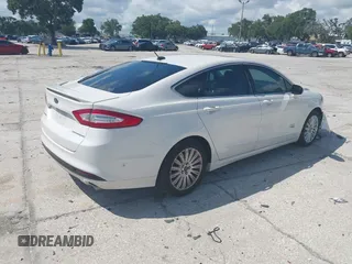 2013 Ford Fusion Titanium with VIN 3FA6P0SU0DR239890, listed as a IAAI auction lot 42745530 with 129,458 mi miles and . Bid and sale history available at DreamBid. Image 4.