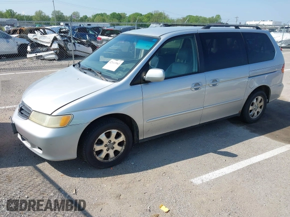 2003 Honda Odyssey EX-L with VIN 5FNRL18983B050769, listed as a IAAI auction lot 42113963 with 287,552 mi miles and . Bid and sale history available at DreamBid. Image 2.