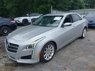 2014 Cadillac CTS Luxury RWD z VIN 1G6AR5S38E0173628, wystawiony jako IAAI lot #42343647 z przebiegiem 166 035 mil mil oraz . Historia ofert i sprzedaży dostępna na DreamBid. Obrazek 2.