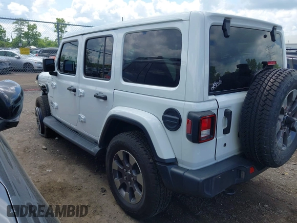 2018 Jeep Wrangler Unlimited Sahara with VIN 1C4HJXEG1JW205789, listed as a IAAI auction lot 42435877 with 57,587 mi miles and . Bid and sale history available at DreamBid. Image 3.