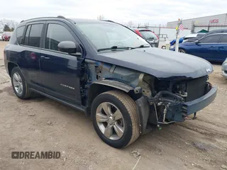 2015 Jeep Compass Sport with VIN 1C4NJCBB5FD115844, listed as a IAAI auction lot 41291608 with 79,819 mi miles and . Bid and sale history available at DreamBid. Image 1.