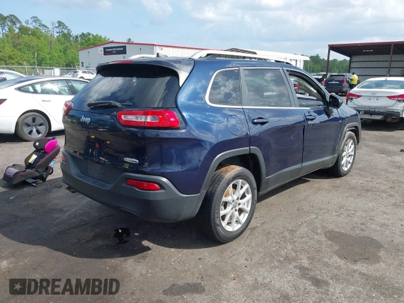 2015 Jeep Cherokee Latitude with VIN 1C4PJLCB5FW694359, listed as a IAAI auction lot 41934213 with 117,723 mi miles and . Bid and sale history available at DreamBid. Image 4.