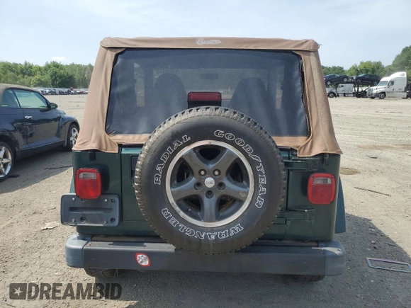 1999 Jeep Wrangler Sahara z VIN 1J4FY49S0XP453920, wystawiony jako Copart lot #61808475 z przebiegiem 129 062 mil mil oraz Czysty tytuł • Clean title. Historia ofert i sprzedaży dostępna na DreamBid. Obrazek 6.
