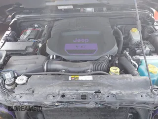 2014 Jeep Wrangler Unlimited Sahara with VIN 1C4BJWEG6EL217945, listed as a IAAI auction lot 42388477 with 61,739 mi miles and . Bid and sale history available at DreamBid. Image 10.