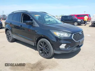 2017 Ford Escape SE with VIN 1FMCU0G9XHUE37185, listed as a IAAI auction lot 42053979 with 72,904 mi miles. Bid and sale history available at carsss.com. Image 1.
