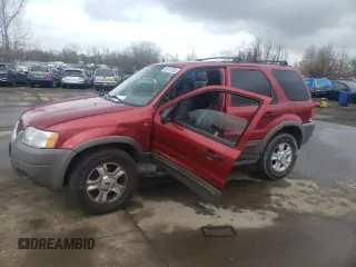 2001 Ford Escape XLT with VIN 1FMCU04101KA36194, listed as a Copart auction lot 43717295 with 72,265 mi miles and Salvage Title. Bid and sale history available at carsss.com. Image 1.