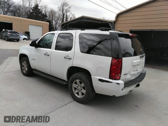 2013 GMC Yukon SLT with VIN 1GKS2CE09DR238626, listed as a IAAI auction lot 41758168 with 170,371 mi miles. Bid and sale history available at carsss.com. Image 3.