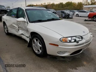 2003 Oldsmobile Aurora z VIN 1G3GS64C834100084, wystawiony jako Copart lot #76966704 z przebiegiem 70 263 mil mil oraz Szkody całkowita. Historia ofert i sprzedaży dostępna na DreamBid. Obrazek 4.