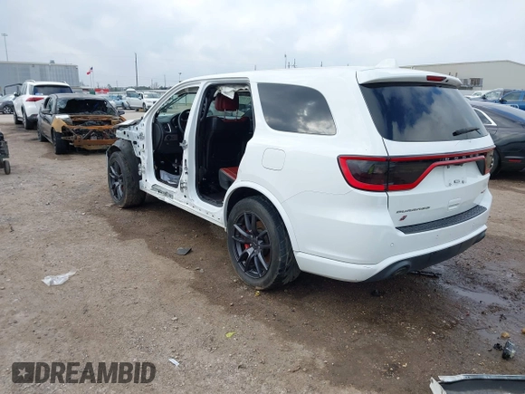 2018 Dodge Durango SRT with VIN 1C4SDJGJ4JC341550, listed as a IAAI auction lot 41525295 with 86,503 mi miles and . Bid and sale history available at DreamBid. Image 3.