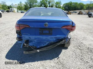 2023 Volkswagen Jetta S with VIN 3VW5M7BU6PM042471, listed as a Copart auction lot 56950155 with 7,043 mi miles and Salvage title. Bid and sale history available at DreamBid. Image 6.