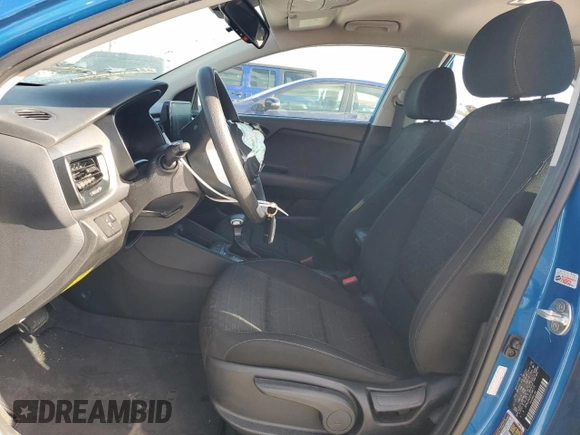 2023 Kia Rio S with VIN 3KPA25AD9PE548173, listed as a Copart auction lot 50232915 with 26,668 mi miles and Salvage Title. Bid and sale history available at DreamBid. Image 7.