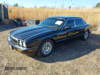 2000 Jaguar XJ with VIN SAJDA23C5YLF19267, listed as a IAAI auction lot 40899052 with 92,553 mi miles and . Bid and sale history available at DreamBid. Image 2.