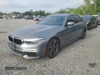 2018 BMW 5 Series M550i xDrive with VIN WBAJB9C50JB287269, listed as a Copart auction lot 52031765 with 100,592 mi miles and Clean Title. Bid and sale history available at carsss.com. Image 1.