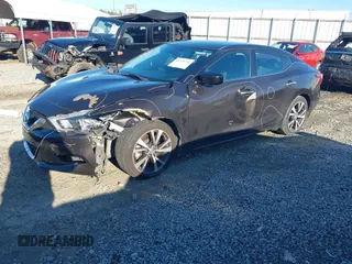 2016 Nissan Maxima SL with VIN 1N4AA6AP1GC448472, listed as a IAAI auction lot 41329749 with 152,644 mi miles and . Bid and sale history available at DreamBid. Image 2.