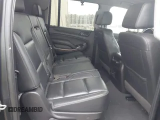 2019 Chevrolet Suburban LT z VIN 1GNSKHKC8KR332167, wystawiony jako IAAI lot #42256453 z przebiegiem 131 882 mil mil oraz . Historia ofert i sprzedaży dostępna na DreamBid. Obrazek 8.