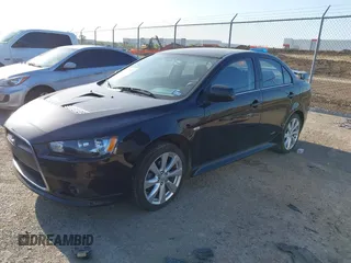2014 Mitsubishi Lancer Ralliart with VIN JA32V6FVXEU005172, listed as a IAAI auction lot 41983895 with 70,584 mi miles and . Bid and sale history available at DreamBid. Image 2.