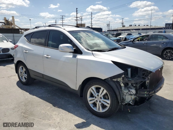 2013 Hyundai Tucson GLS with VIN KM8JU3AC5DU658281, listed as a Copart auction lot 51577995 with 136,373 mi miles and Salvage Title. Bid and sale history available at carsss.com. Image 4.