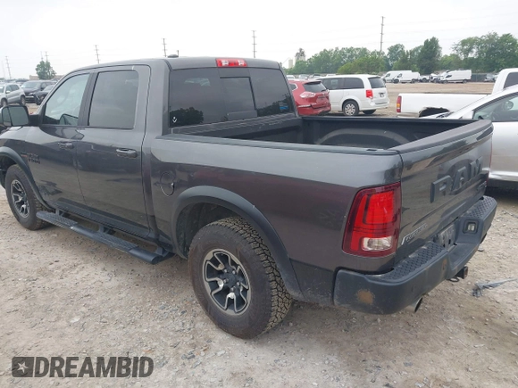 2017 Ram 1500 Rebel with VIN 1C6RR7YT5HS610293, listed as a IAAI auction lot 42454064 with 103,515 mi miles and . Bid and sale history available at DreamBid. Image 3.