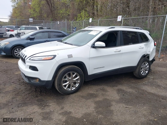 2016 Jeep Cherokee North with VIN 1C4PJMCS6GW120702, listed as a IAAI auction lot 41983998 with 77,060 mi miles. Bid and sale history available at carsss.com. Image 22.