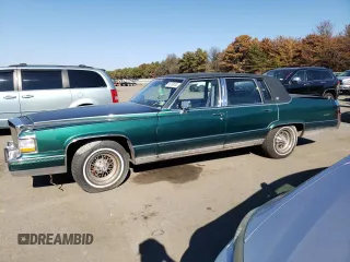 1992 Cadillac Brougham z VIN 1G6DW547XNR703499, wystawiony jako Copart lot #66709103 z przebiegiem Nie podano mil oraz Nie do naprawy. Historia ofert i sprzedaży dostępna na DreamBid. Obrazek 1.
