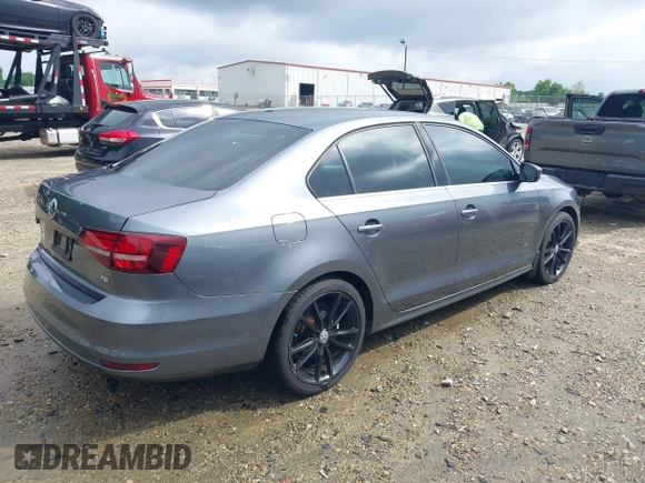 2017 Volkswagen Jetta S with VIN 3VW2B7AJ5HM368618, listed as a IAAI auction lot 42435559 with 112,781 mi miles and . Bid and sale history available at DreamBid. Image 4.