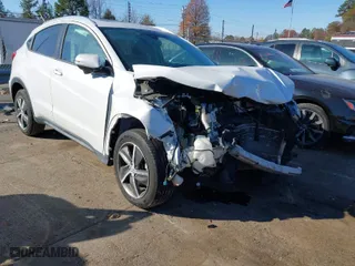 2021 Honda HR-V EX with VIN 3CZRU6H5XMM750887, listed as a IAAI auction lot 40983288 with 56,482 mi miles. Bid and sale history available at carsss.com. Image 1.