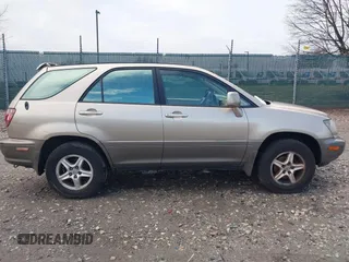 1999 Lexus RX 300 Luxury SUV with VIN JT6HF10U7X0090467, listed as a IAAI auction lot 41792768 with 263,408 mi miles. Bid and sale history available at carsss.com. Image 12.