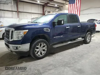 2017 Nissan Titan SL z VIN 1N6BA1F22HN517090, wystawiony jako Copart lot #45723105 z przebiegiem 121 200 mil mil oraz Czysty tytuł • Clean title. Historia ofert i sprzedaży dostępna na DreamBid. Obrazek 1.
