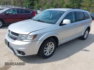 2014 Dodge Journey SXT z VIN 3C4PDDBG8ET155636, wystawiony jako IAAI lot #42215777 z przebiegiem 193 708 mil mil oraz . Historia ofert i sprzedaży dostępna na DreamBid. Obrazek 2.