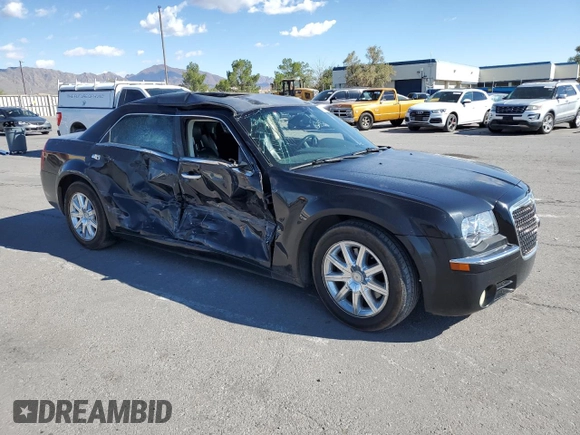 2009 Chrysler 300 with VIN 2C3KA63T69H626101, listed as a Copart auction lot 70259914 with 172,078 mi miles and Salvage Title. Bid and sale history available at carsss.com. Image 4.
