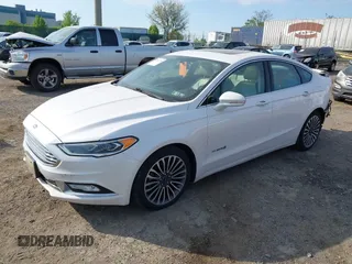 2017 Ford Fusion Hybrid Titanium с VIN 3FA6P0RU7HR148191, выставлен на аукционе IAAI как лот 42167708 с пробегом 72 708 миль миль и . История ставок и продаж доступна на DreamBid. Изображение 2.