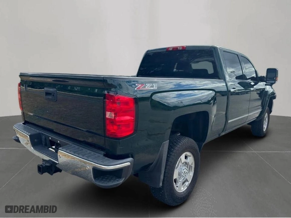 2015 GMC Sierra 2500HD SLT with VIN 1GT12ZE82FF581685, listed as a Copart auction lot 49547015 with NaN miles and Clean Title. Bid and sale history available at carsss.com. Image 3.