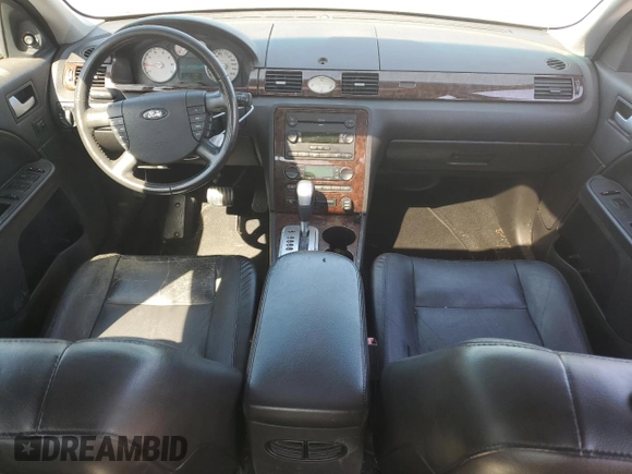 2006 Ford Five Hundred Limited с VIN 1FAHP251X6G169668, выставлен на аукционе Copart как лот 57578865 с пробегом 165 946 миль миль и Списание • Salvage title. История ставок и продаж доступна на DreamBid. Изображение 8.
