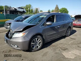 2016 Honda Odyssey Touring Elite with VIN 5FNRL5H91GB092214, listed as a Copart auction lot 61158745 with 121,477 mi miles and Salvage title. Bid and sale history available at DreamBid. Image 1.