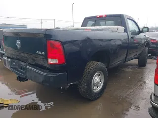 2015 Ram 2500 Tradesman with VIN 3C6LR5AT3FG650199, listed as a IAAI auction lot 41650279 with 125,671 mi miles. Bid and sale history available at carsss.com. Image 4.