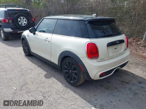 2014 MINI Hardtop S with VIN WMWXM7C55ET970769, listed as a IAAI auction lot 42181868 with 173,839 mi miles and . Bid and sale history available at DreamBid. Image 3.